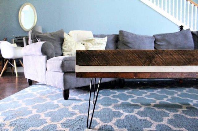 Coffee table with 2rod hairpin legs and think wood top in a modern living room