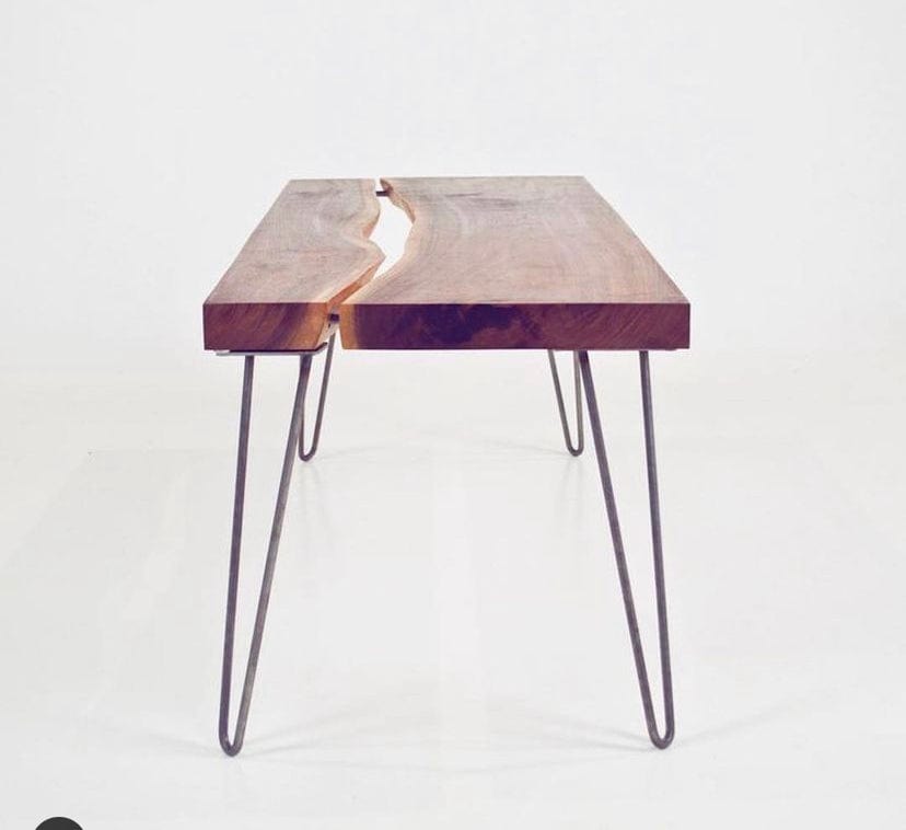 Modern coffee table featuring 2rod steel hairpin legs and a live edge wood top.